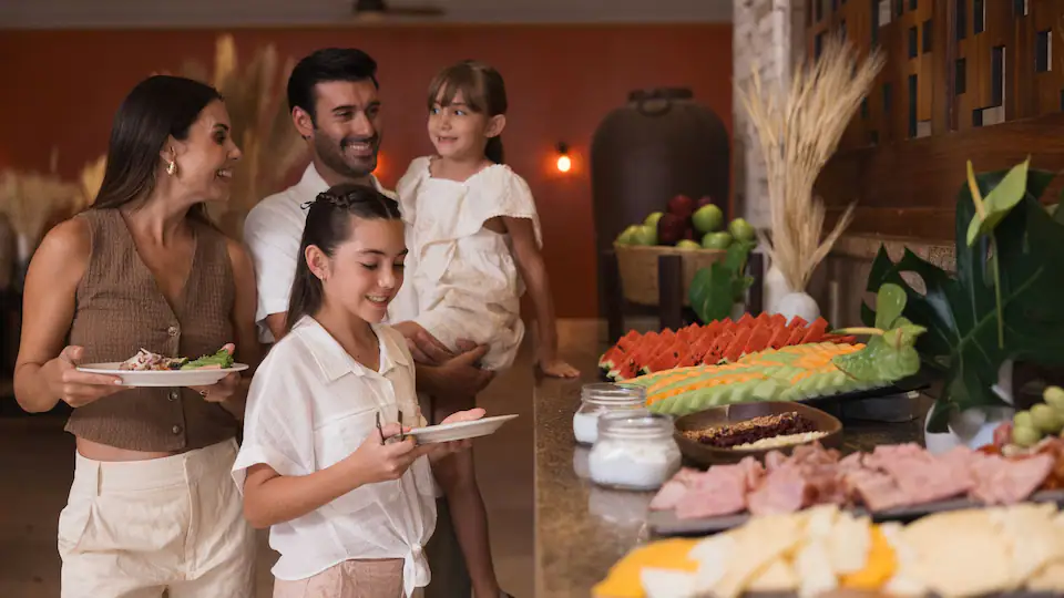 VivaZ Buffet at Hyatt Ziva Puerto Vallarta featuring diverse international cuisine, live cooking stations, and a bright family-friendly dining atmosphere.