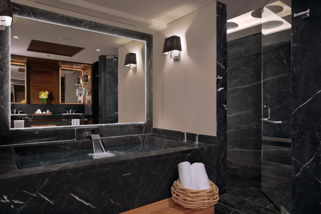 Master Suite Ocean View bathroom with soaking tub and rain shower at Impression Moxché by Secrets.