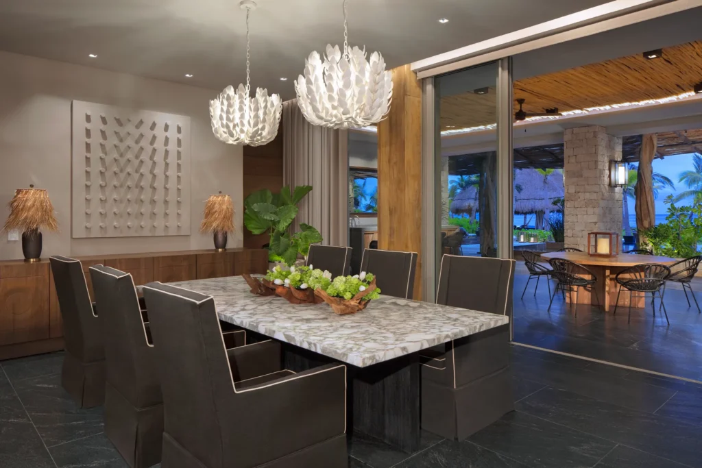 Presidential Villa Beach Front dining room with seating for eight at Impression Moxché by Secrets.