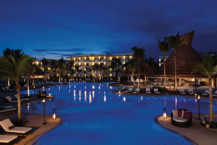 secrets-akumal-main-pool-night-lights