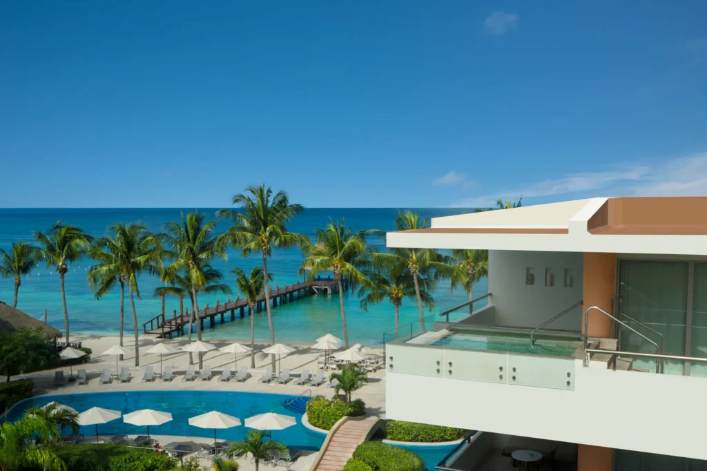 Rooftop ocean view suite with private plunge pool overlooking beach at Secrets Aura Cozumel.