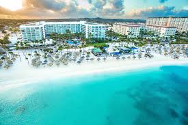 Aruba Marriott Resort and Stellaris Casino beachfront hotel on Palm Beach with high-rise tower, casino, pools, and white sand beach.