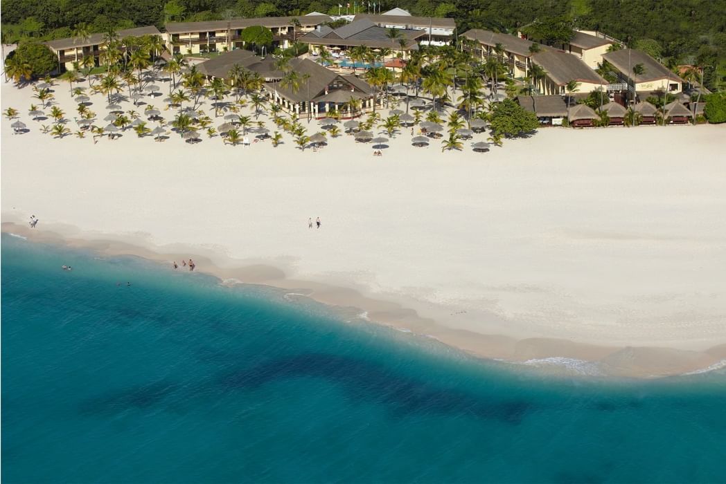Manchebo Beach Resort and Spa boutique beachfront hotel in Aruba with intimate setting, yoga retreats, and Eagle Beach access.
