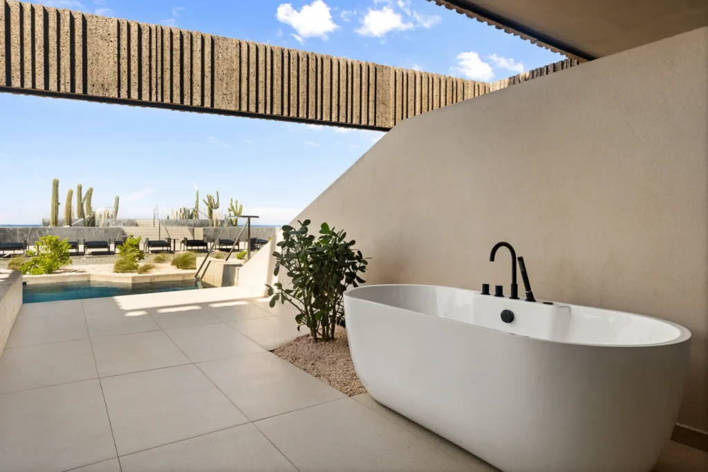 Preferred Club Junior Suite Private Pool terrace with soaking tub and private plunge pool at Secrets Baby Beach Aruba.