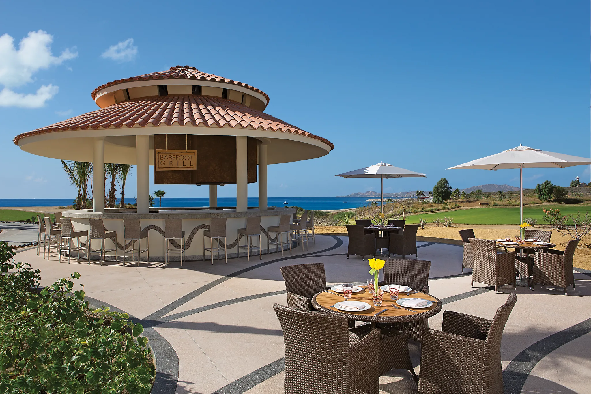 Barefoot Grill poolside dining at Secrets Puerto Los Cabos for quick burgers, tacos, and casual bites
