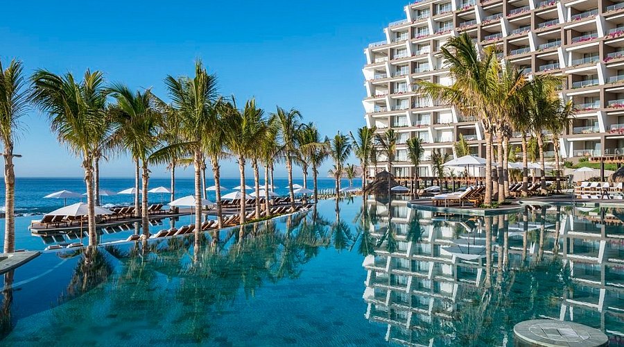 Grand Velas Los Cabos luxury all-inclusive resort with infinity pools, ocean views, and modern architecture in Baja California.