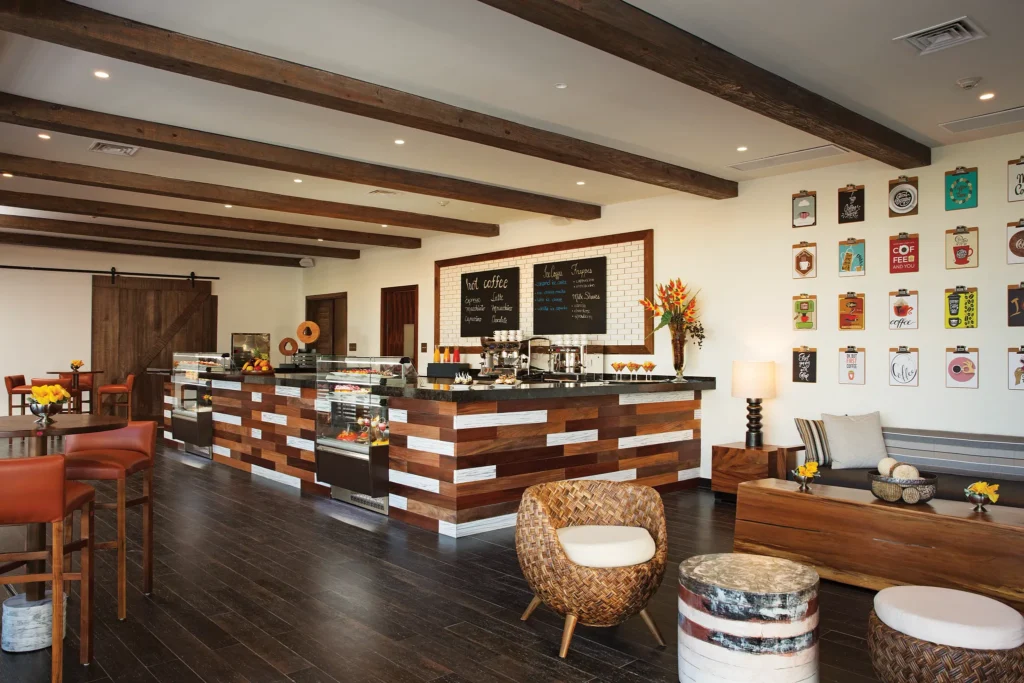 Coco Café at Secrets Cap Cana Resort & Spa featuring a cozy coffeehouse atmosphere, specialty coffees, pastries, and light snacks.
