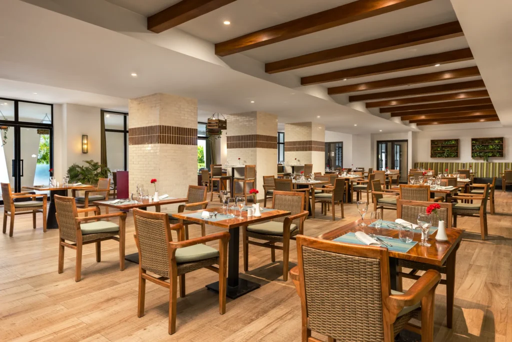 Market Café at Secrets Cap Cana Resort & Spa featuring an international buffet, fresh culinary stations, and elegant open-air dining.