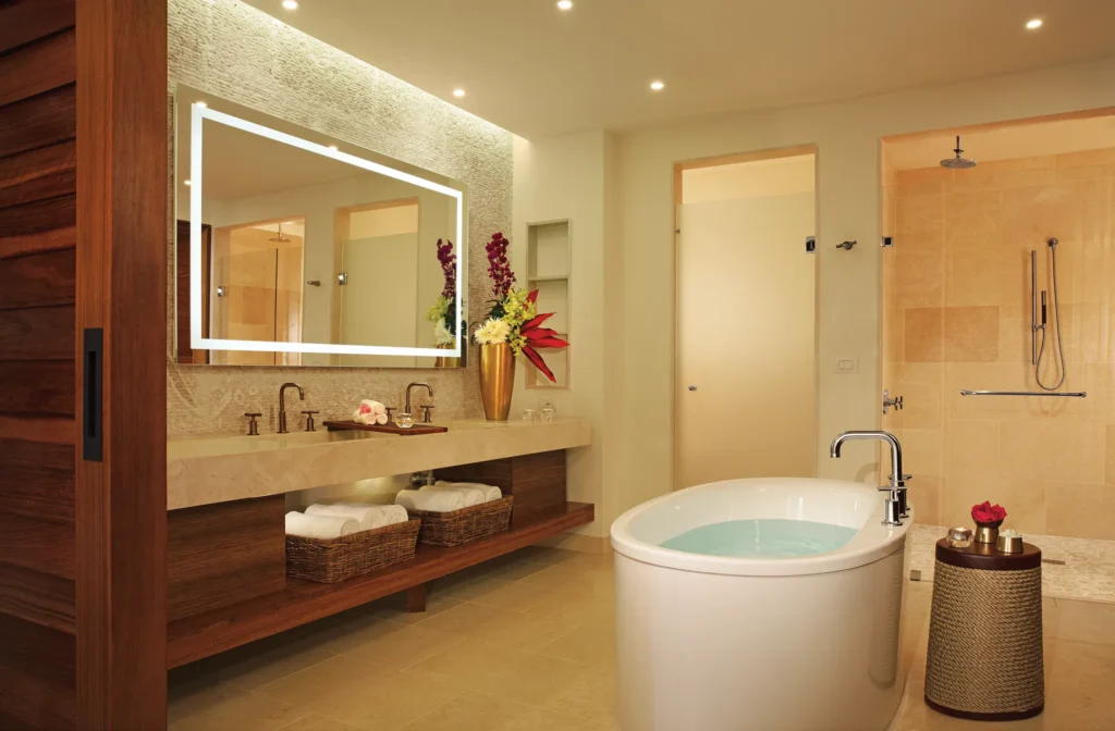 Preferred Club Master Suite Plunge Pool Ocean Front bathroom with freestanding soaking tub, double vanity, and dual rain showers.