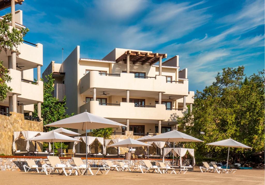 Celeste Beach Residences & Spa boutique luxury resort with intimate pools and oceanfront suites in Huatulco, Mexico.
