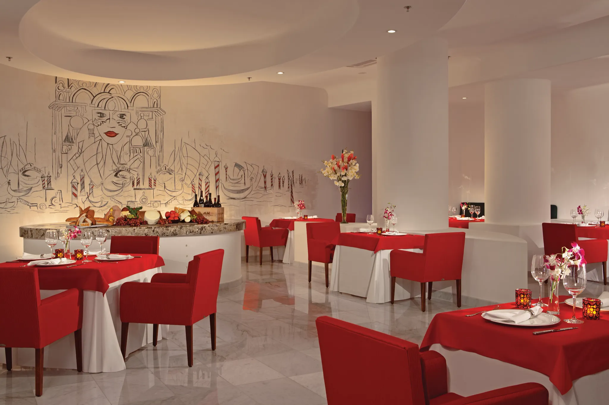 CinCin Italian restaurant at Secrets Huatulco with warm ambience for pasta, wine, and romantic evenings on the Oaxacan coast