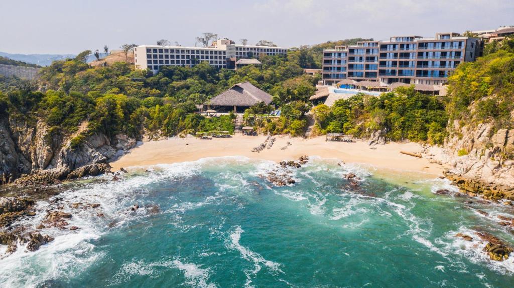 Coral Blue Huatulco Boutique Hotel intimate property with pool and garden views in a quieter Huatulco setting near the beach.