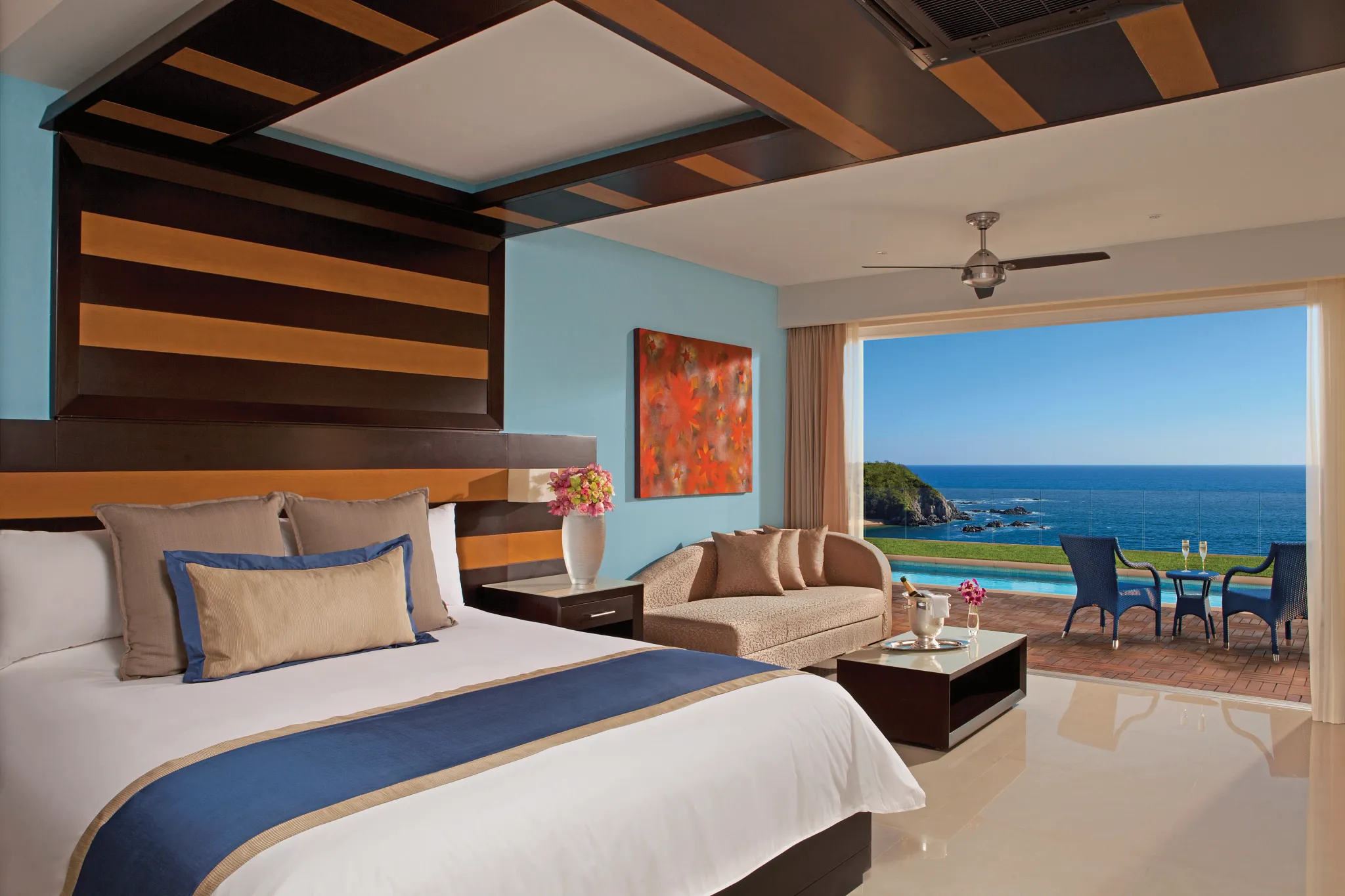 Preferred Club Junior Suite Swim Out at Secrets Huatulco with king bed, modern tropical décor, and direct swim-out pool access from private terrace.