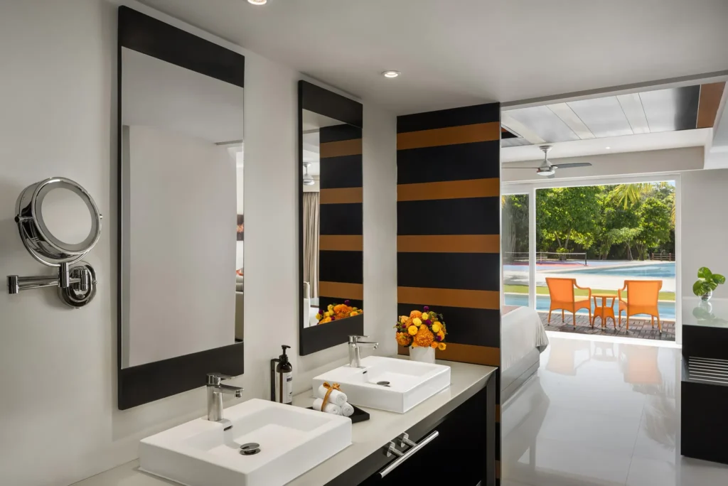 Preferred Club One-Bedroom Swim Out bathroom with double sinks and modern design at Secrets Huatulco Resort & Spa.