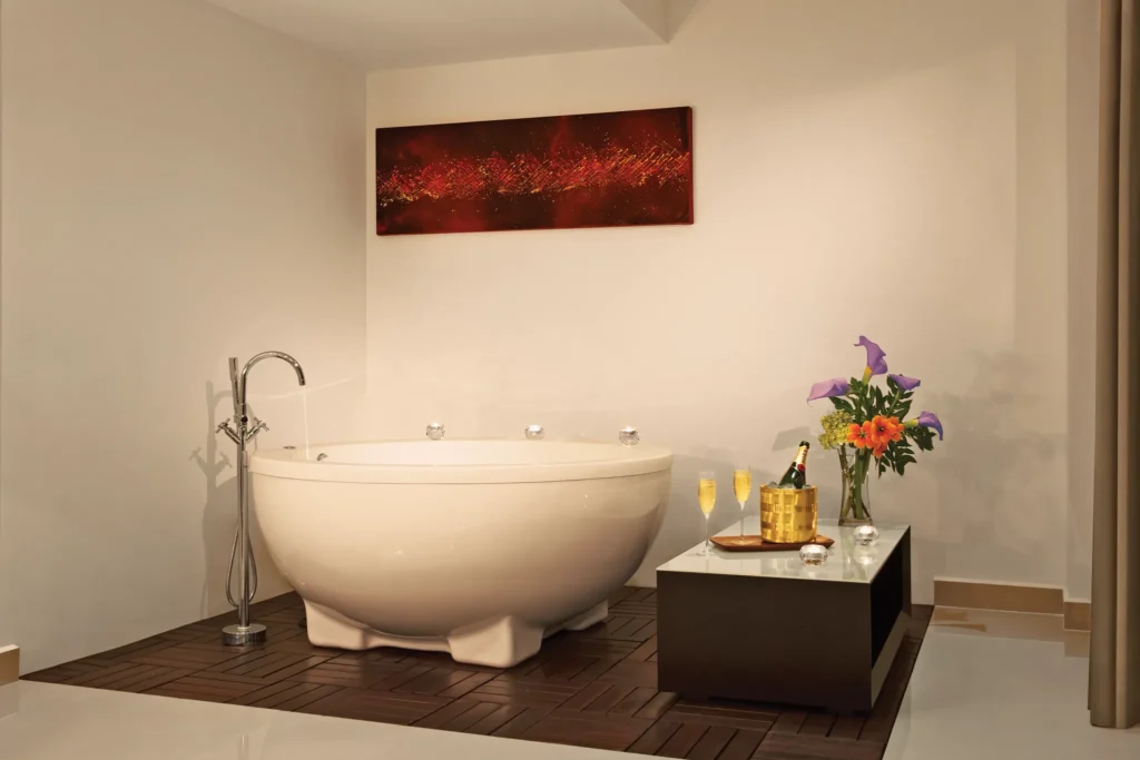 Preferred Club Two-Level Presidential Suite Swim Out bathroom with hot tub for two at Secrets Huatulco Resort & Spa.