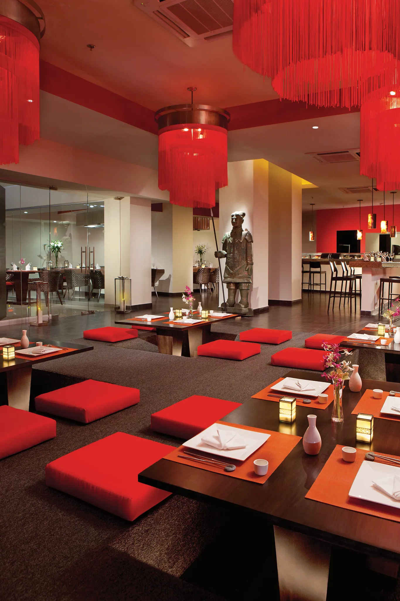 Spice Pan-Asian restaurant at Secrets Huatulco offering sushi, Thai, and Asian fusion cuisine in a stylish setting