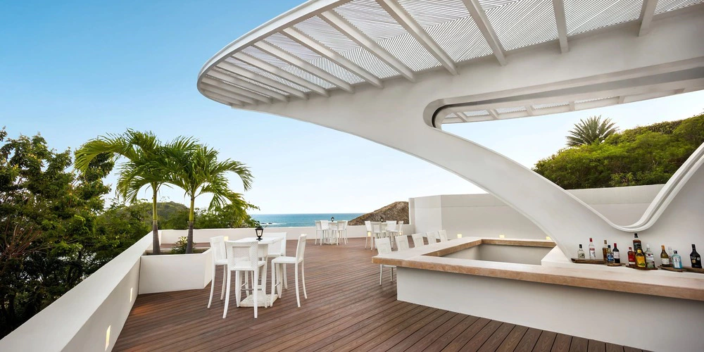Sugar Reef Terrace wedding venue at Secrets Huatulco with ocean views and reception setup
