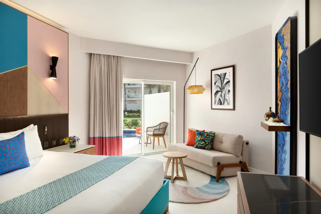 Preferred Club Swim Out Garden View king room with direct pool access at Secrets La Romana Resort & Spa.