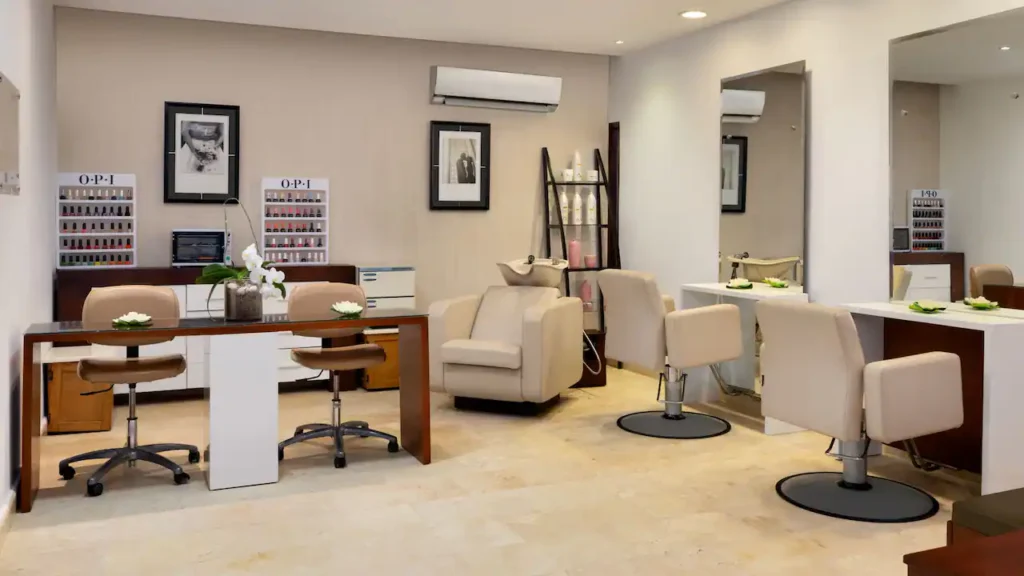 Luxury spa salon with manicure and beauty stations at Secrets La Romana Resort & Spa.