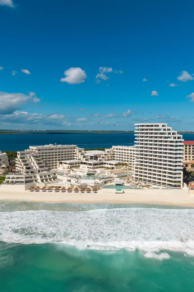 Oceanfront aerial view of Secrets Mirabel Cancun Resort & Spa along Cancun’s Caribbean coastline.
