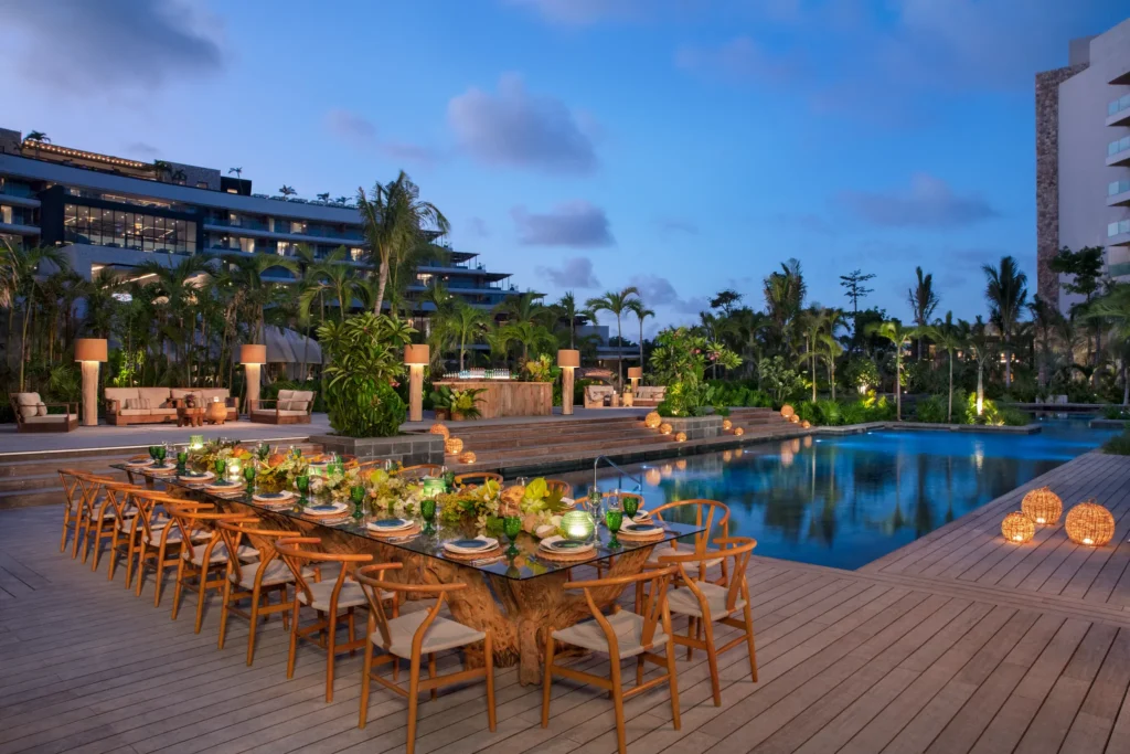Poolside banquet reception setup by the Cross Pool at Secrets Moxché Playa Del Carmen