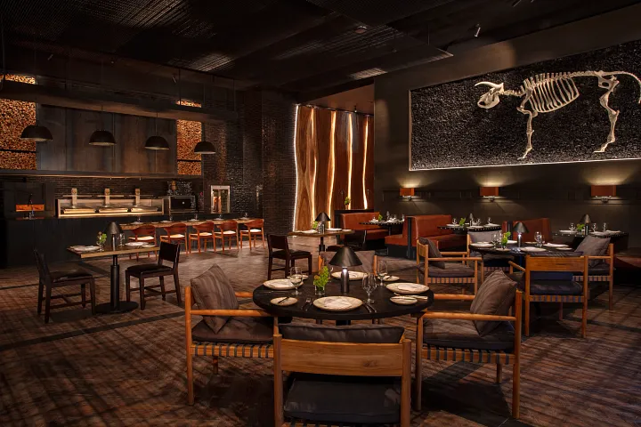 Ember fire kitchen restaurant at Secrets Moxché Playa del Carmen featuring open-flame grilled steaks and bold flavors