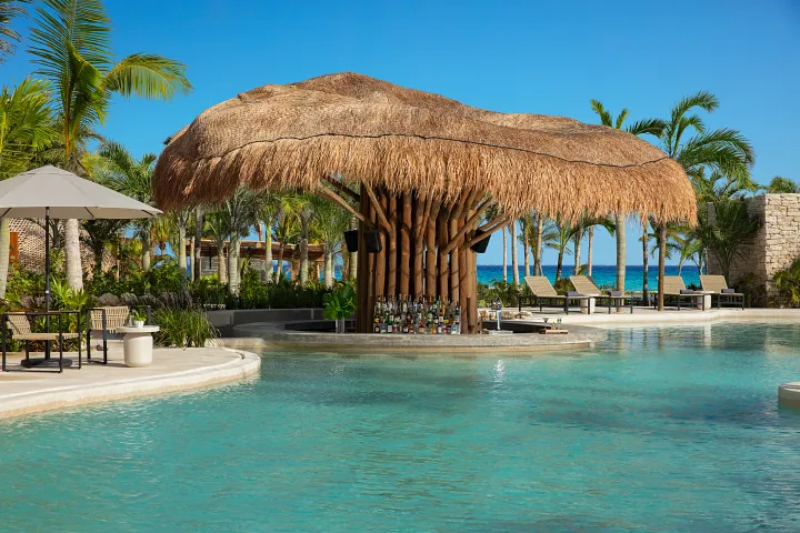 Mantarray swim-up bar at Secrets Moxché Playa del Carmen for poolside cocktails without leaving the water