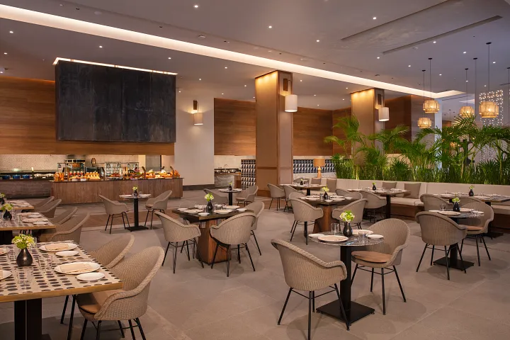 Market Café buffet restaurant at Secrets Moxché Playa del Carmen offering international cuisine stations for breakfast, lunch, and dinner