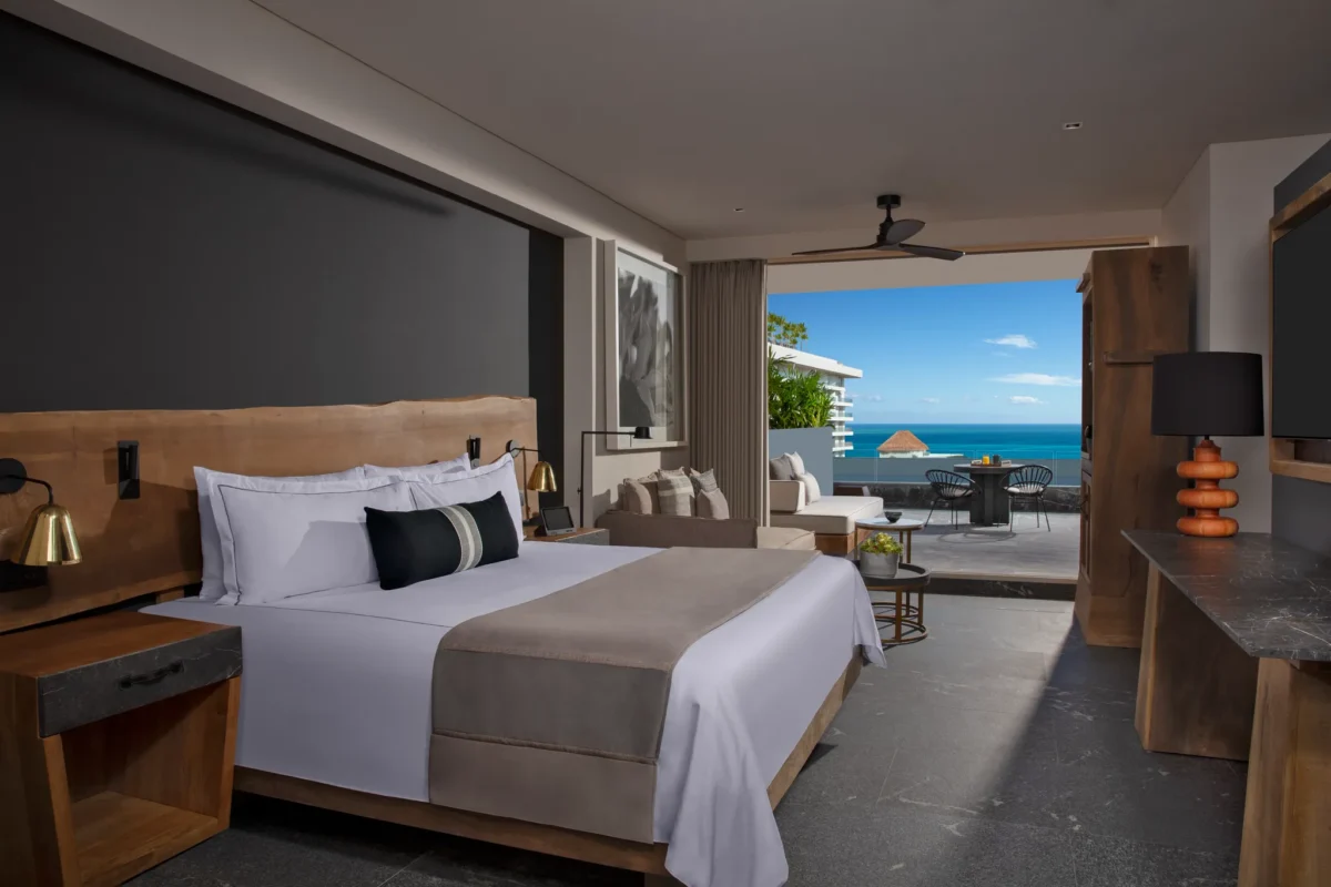 Preferred Club Superior Junior Suite Ocean View with king bed and terrace at Secrets Moxché Playa del Carmen.