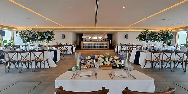 Sky Rooftop Indoor Salon wedding venue at Secrets Moxché Playa del Carmen with elegant reception setup