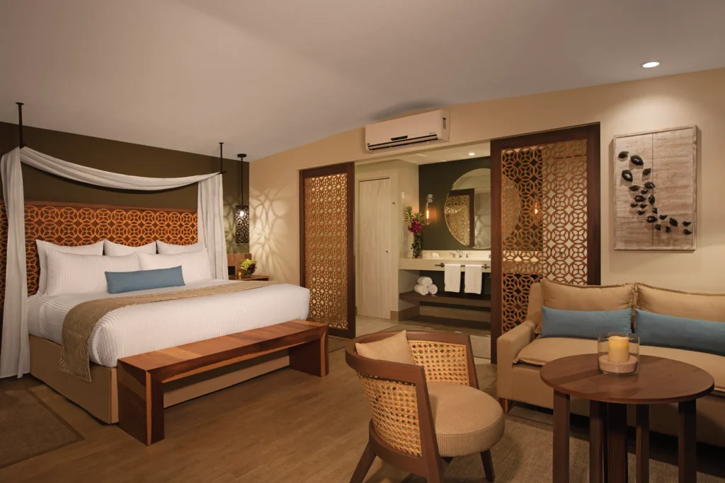 Bungalow Suite Tropical View interior with seating area at Secrets Papagayo Costa Rica.