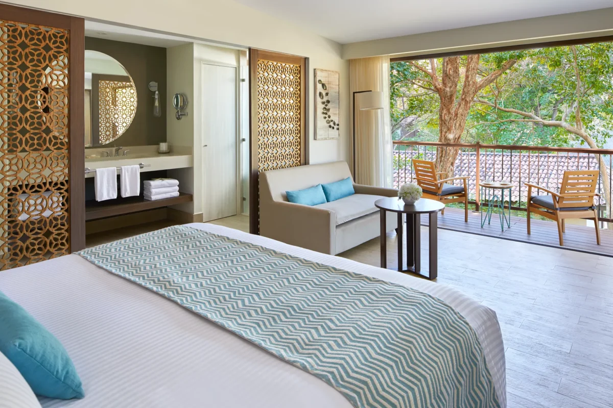 Bungalow Suite Tropical View with king-size bed at Secrets Papagayo Costa Rica.