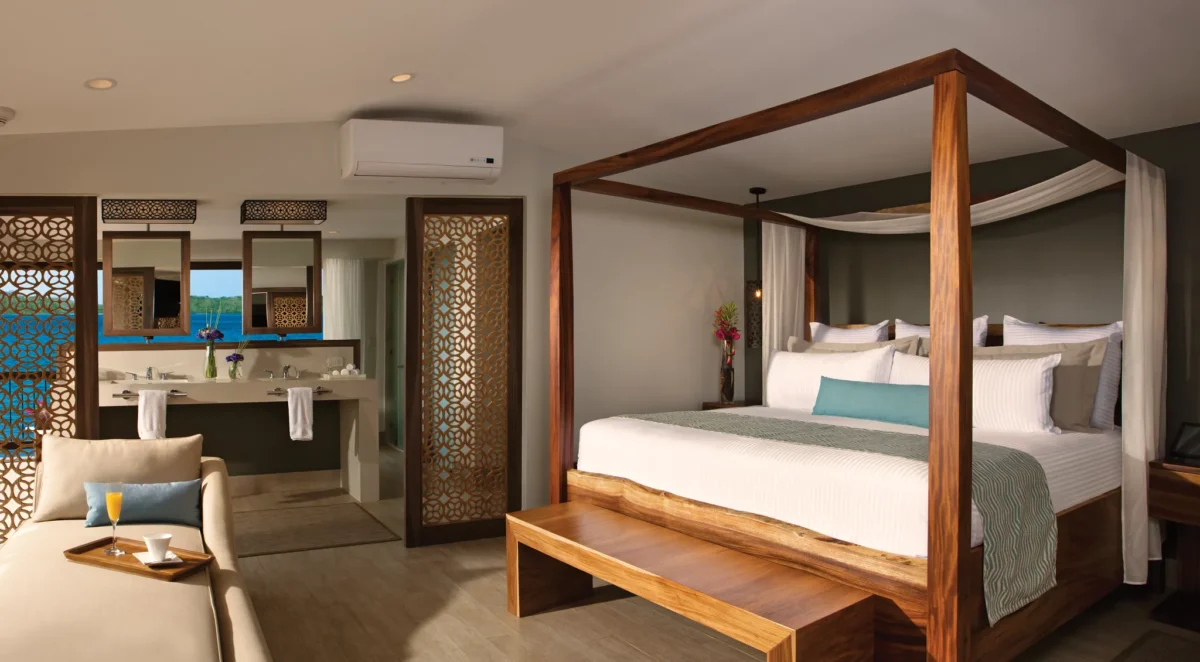 Preferred Club Honeymoon Suite bedroom with king bed and ocean view at Secrets Papagayo Costa Rica.
