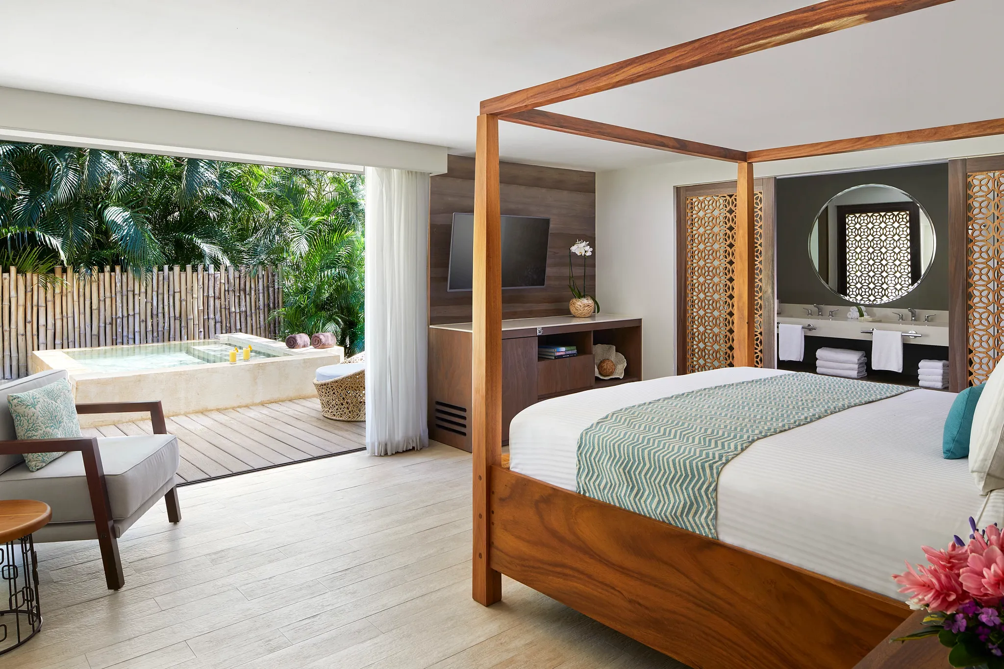 Preferred Club Presidential Suite primary bedroom with king bed at Secrets Papagayo Costa Rica.