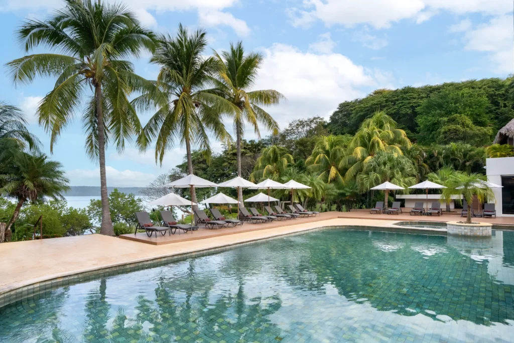 Tranquil spa pool surrounded by tropical greenery at Secrets Papagayo Costa Rica.
