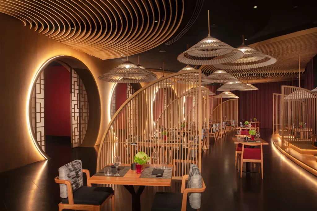 Himitsu Pan-Asian restaurant at Secrets Playa Blanca Costa Mujeres featuring sushi bar, teppanyaki tables, and elegant Asian-inspired décor.