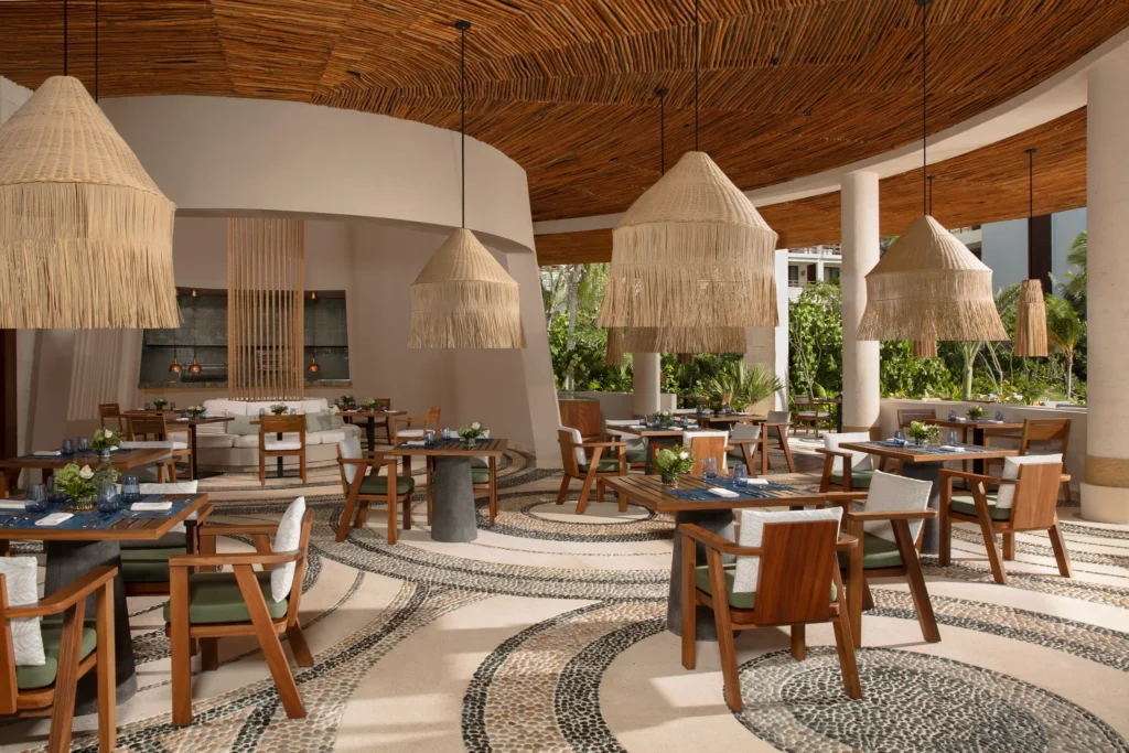 Oceana seafood restaurant at Secrets Playa Blanca Costa Mujeres featuring open-air dining, fresh seafood dishes, and ocean-inspired ambiance.