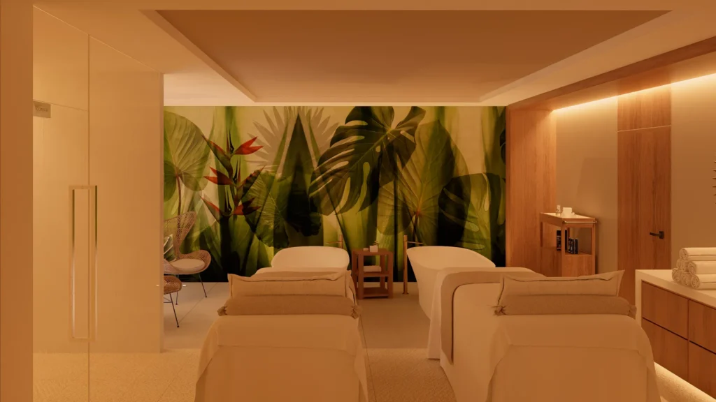 Couple’s massage room with warm lighting and tropical decor at Secrets Playa Esmeralda Resort & Spa.