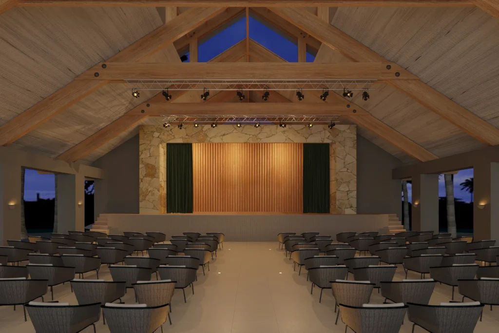 Large event theater with seating and stage at Secrets Playa Esmeralda Resort & Spa.