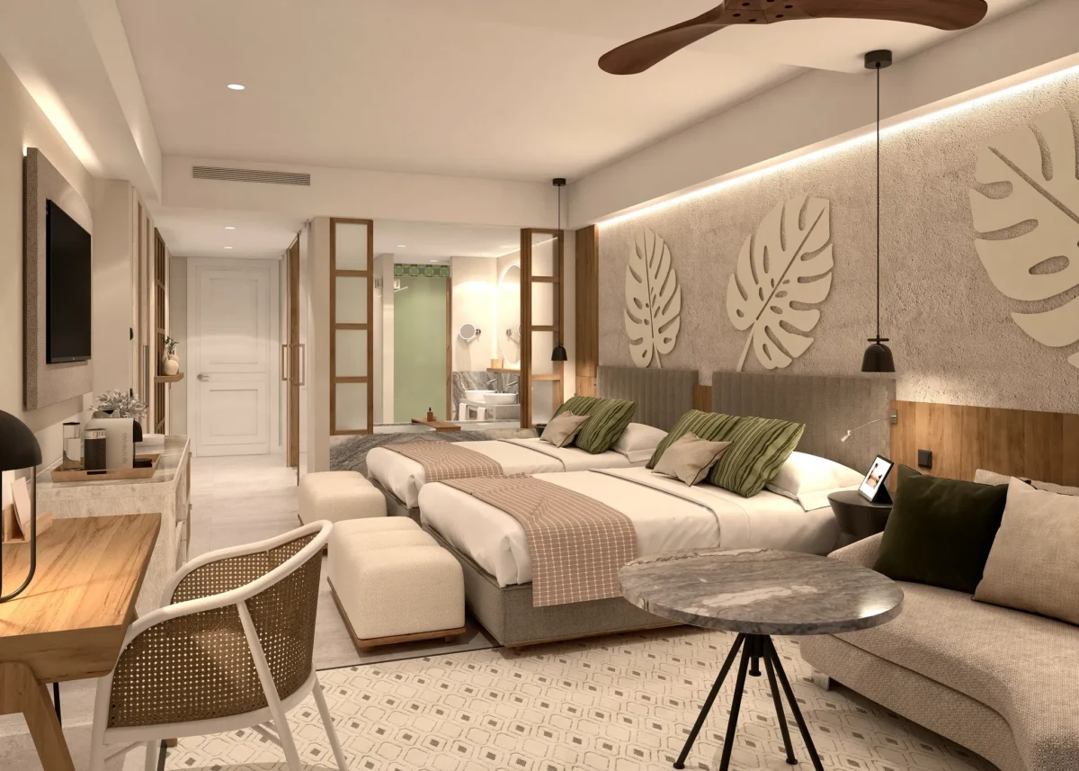 Junior Suite Ocean View with two double beds and modern décor at Secrets Playa Esmeralda Resort & Spa.