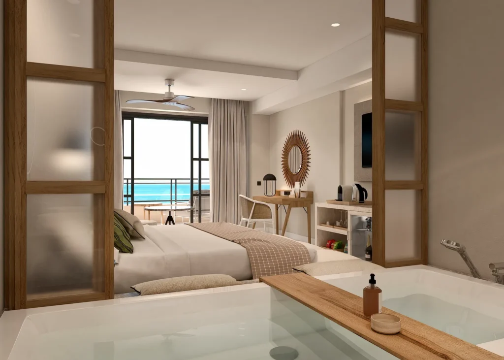 Junior Suite Swim Out king bed with open layout and terrace access at Secrets Playa Esmeralda Resort & Spa.
