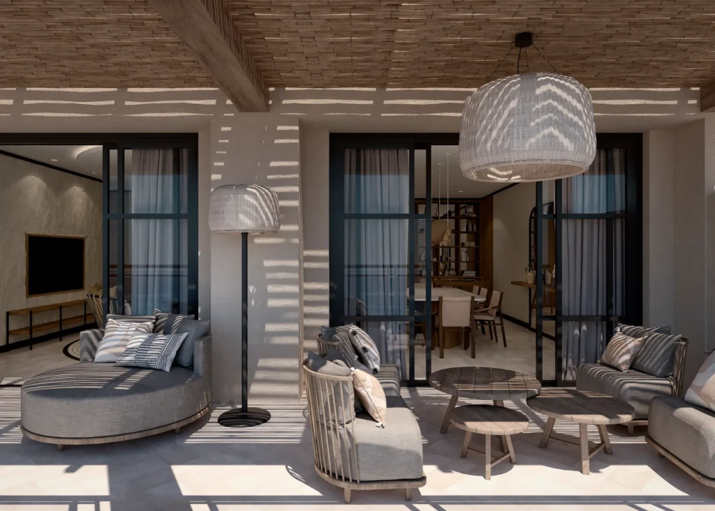 Presidential Suite oceanfront terrace with lounge seating and shaded pergola at Secrets Playa Esmeralda.