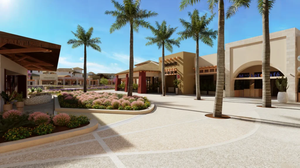 Resort courtyard with restaurants and landscaped gardens at Secrets Playa Esmeralda Resort & Spa.
