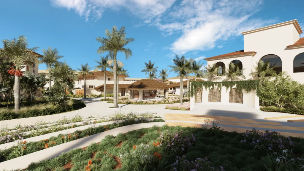 Tropical plaza courtyard with palm trees and walkways at Secrets Playa Esmeralda Resort & Spa.