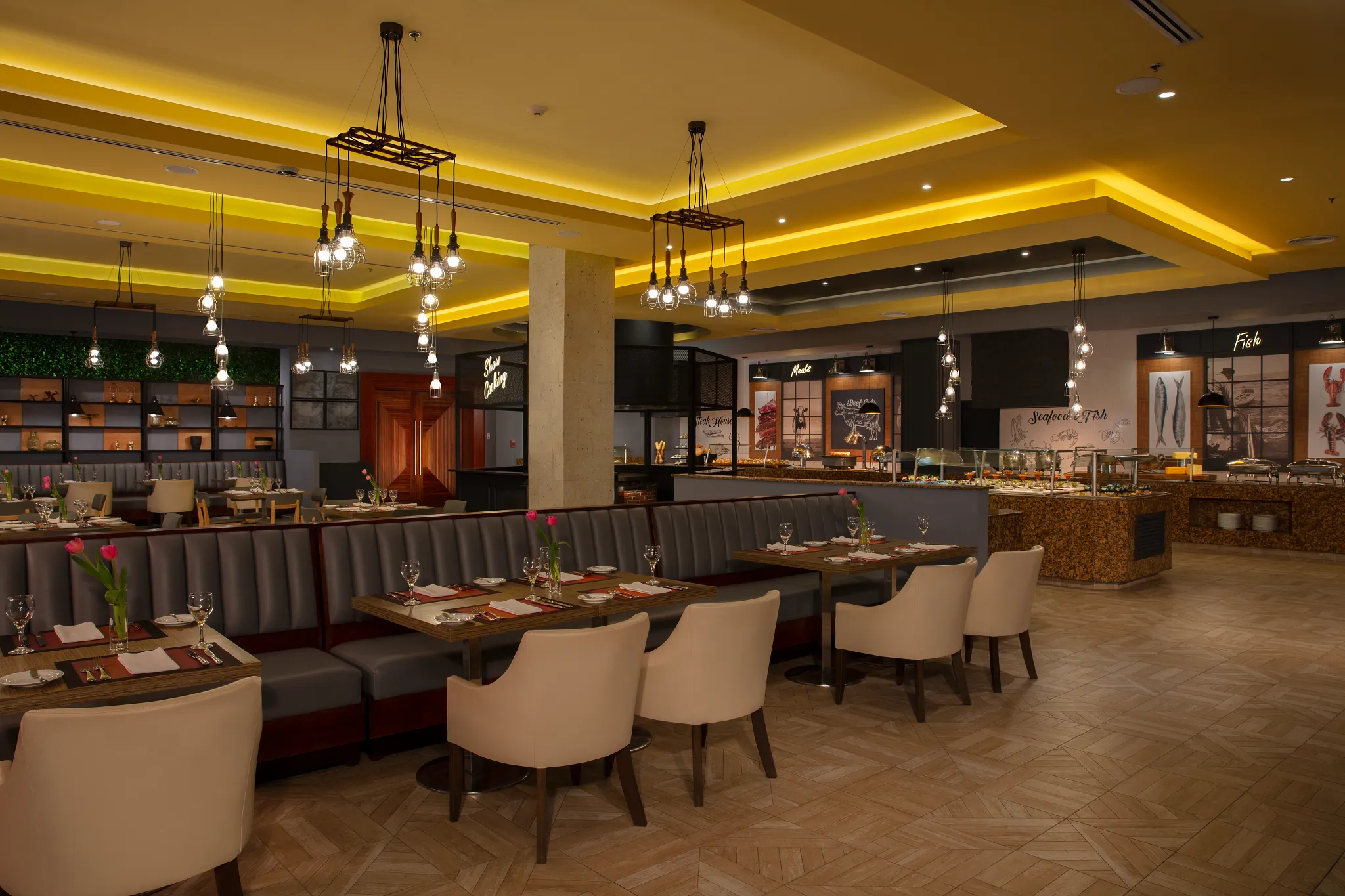 Market Café international buffet at Secrets Playa Mujeres Golf & Spa Resort featuring a modern farmers market-style dining area with gourmet food stations.