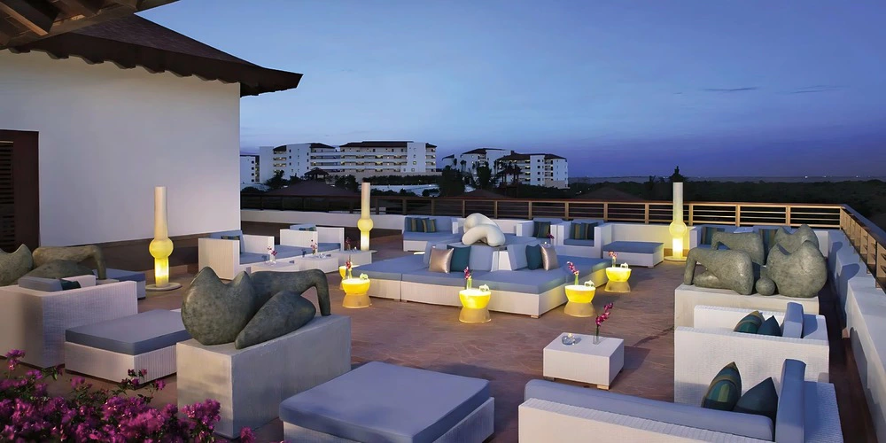 Desires Terrace rooftop lounge setup for wedding events at Secrets Playa Mujeres