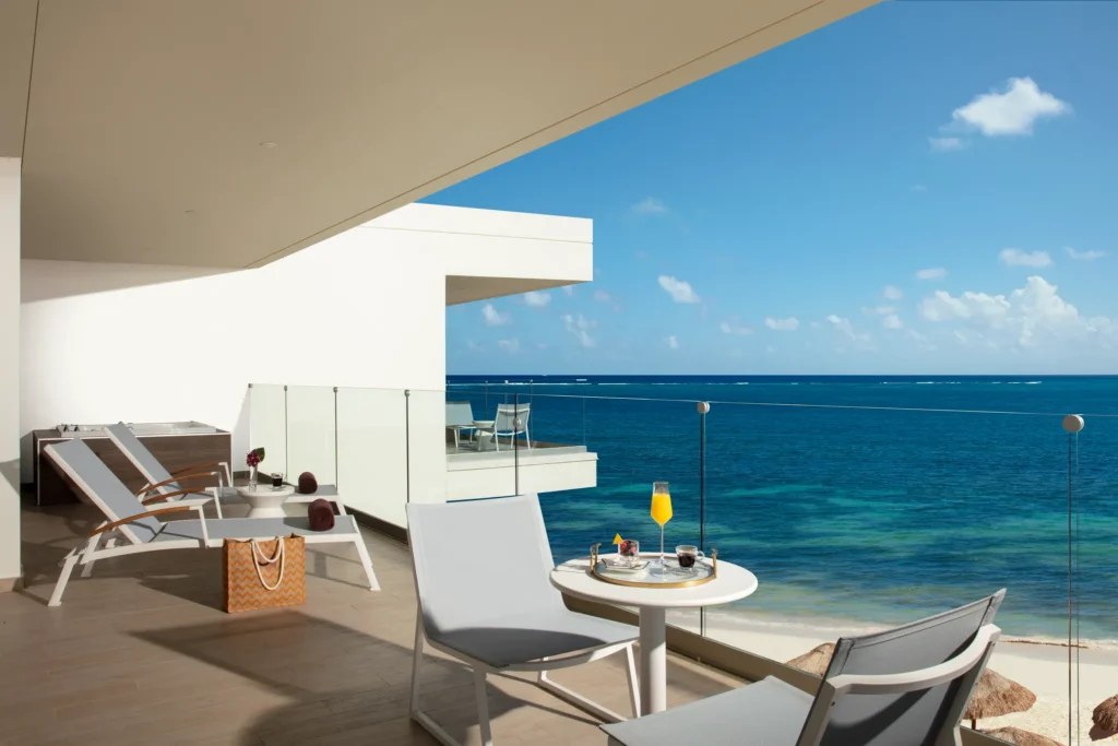 Preferred Club Master Suite Ocean Front terrace with private hot tub overlooking the Caribbean Sea at Secrets Riviera Cancun.
