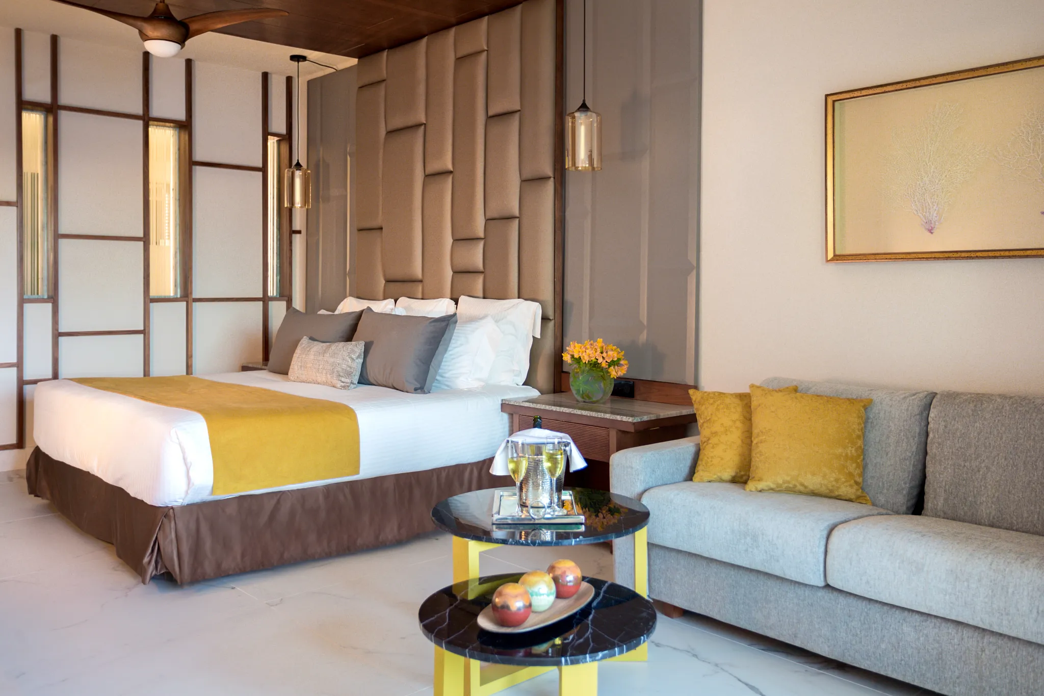 Preferred Club Junior Suite Pool View with king bed and seating area at Secrets Royal Beach Punta Cana.