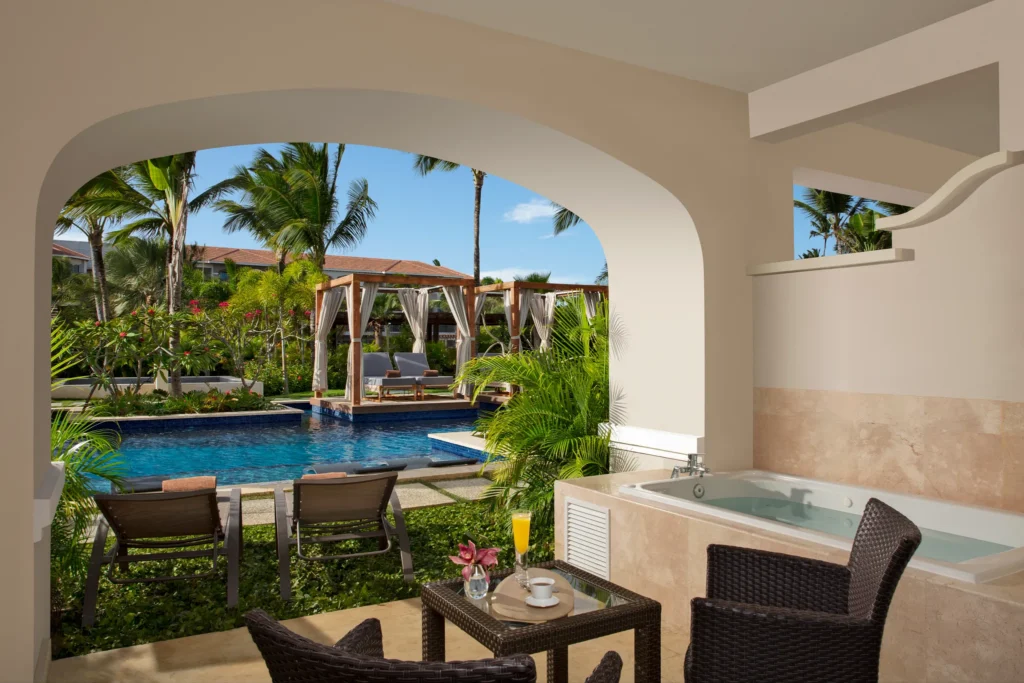 Preferred Club Junior Suite Swim Up terrace with hot tub and direct pool access at Secrets Royal Beach Punta Cana.