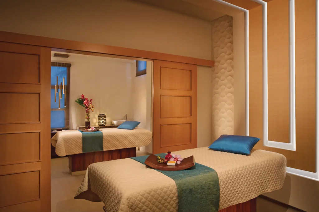 Couples massage setup in a private spa suite at Secrets St. James Montego Bay.